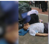 教育新闻：上海浦东新区的大街上95后姑娘给昏厥老人边做心肺复苏边嚎啕大哭
